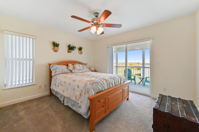 bedroom featuring access to exterior, ceiling fan, and carpet floors