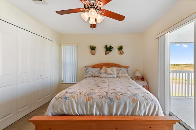 bedroom featuring carpet flooring, ceiling fan, access to outside, and a closet