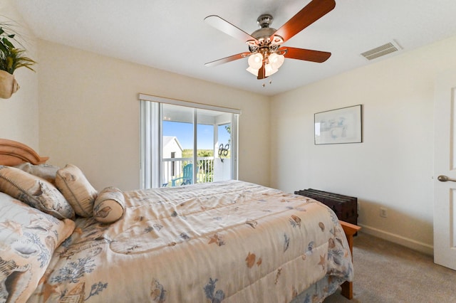 carpeted bedroom with access to outside and ceiling fan