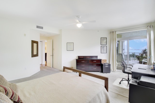 bedroom featuring ceiling fan, access to exterior, and light colored carpet