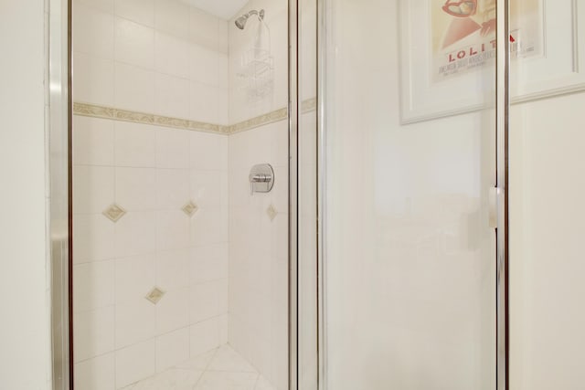 bathroom featuring an enclosed shower