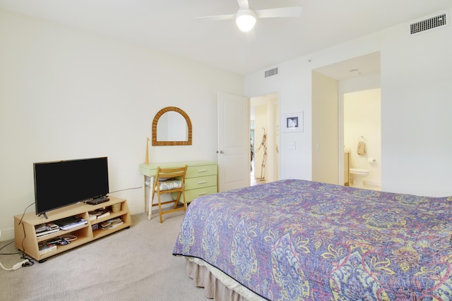 bedroom with carpet flooring, connected bathroom, and ceiling fan