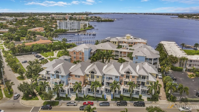 birds eye view of property featuring a water view