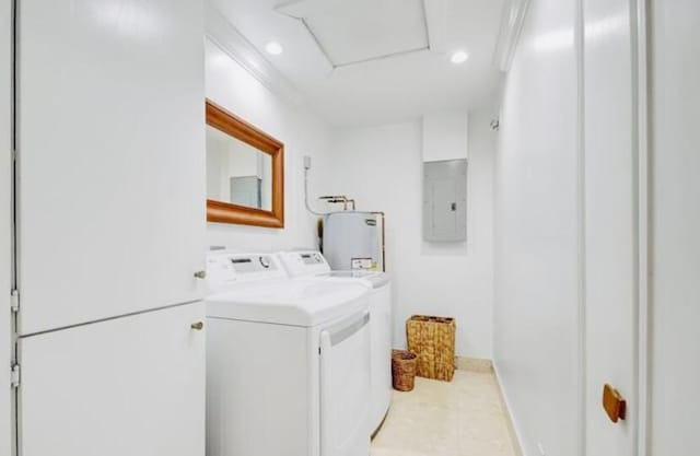 washroom featuring electric panel, water heater, light tile patterned flooring, and separate washer and dryer