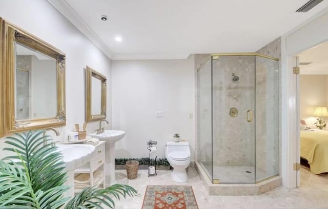 bathroom with toilet and walk in shower