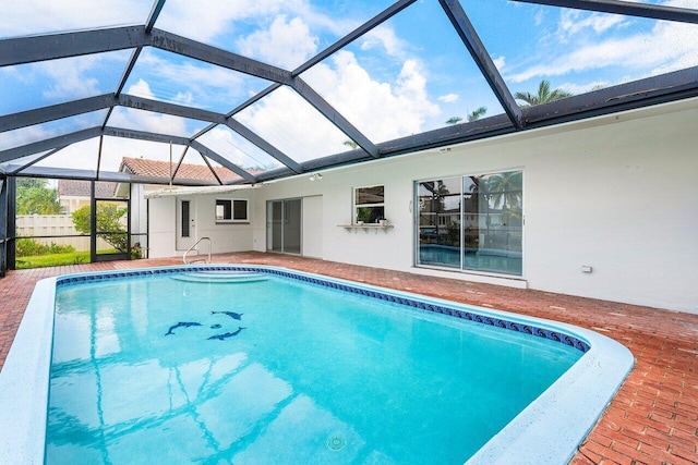 view of pool with a lanai