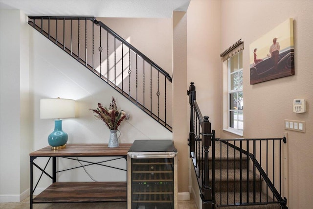 stairway featuring beverage cooler