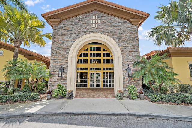 doorway to property featuring french doors