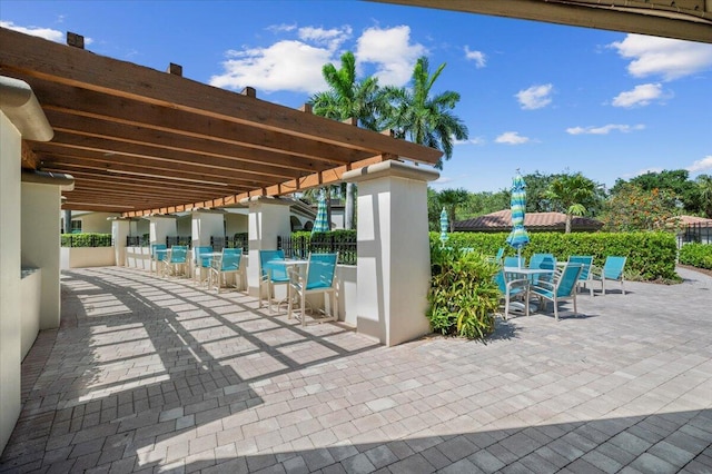 view of patio featuring a pergola