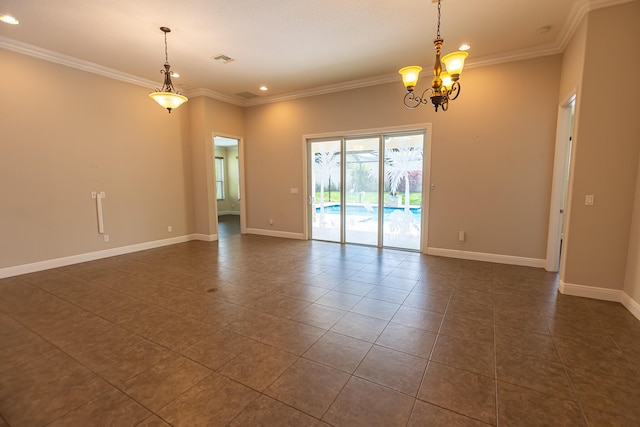 unfurnished room with a notable chandelier, ornamental molding, and dark tile patterned floors