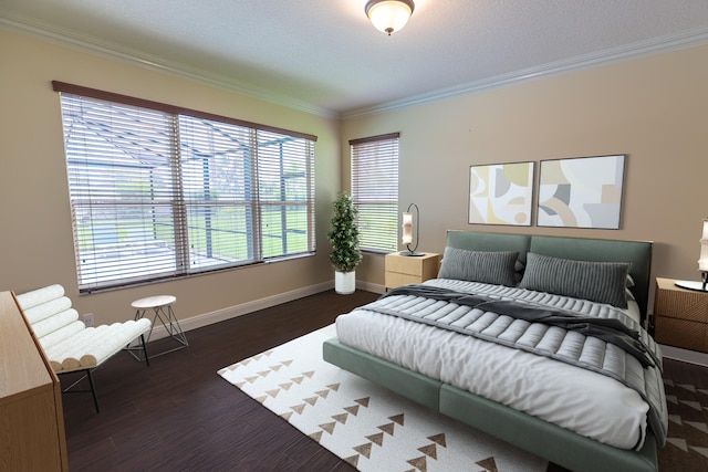 bedroom featuring crown molding and dark hardwood / wood-style floors