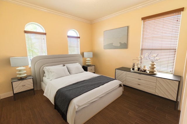 bedroom featuring ornamental molding and dark hardwood / wood-style floors