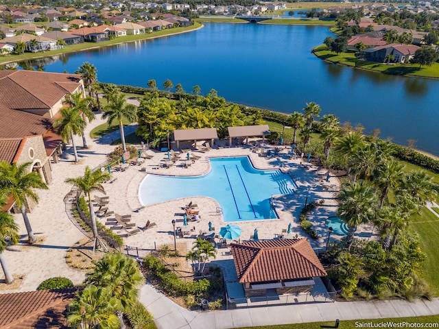 view of pool with a water view