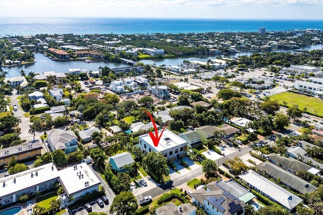 bird's eye view with a water view and a residential view