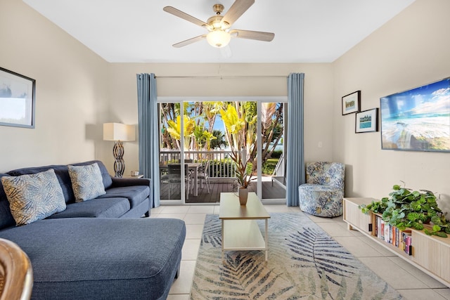 living room featuring ceiling fan and light tile patterned floors