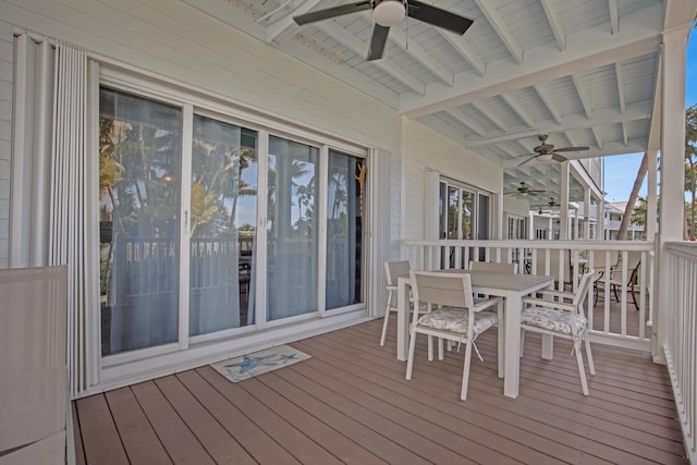 wooden terrace featuring ceiling fan