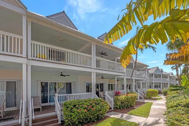 exterior space featuring ceiling fan, covered porch, and a balcony