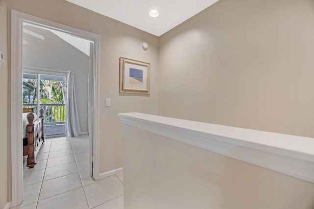 hallway featuring light tile patterned floors