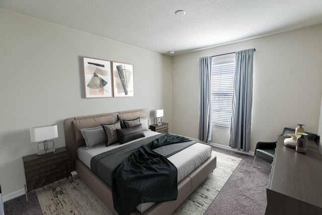 bedroom featuring carpet flooring and a textured ceiling