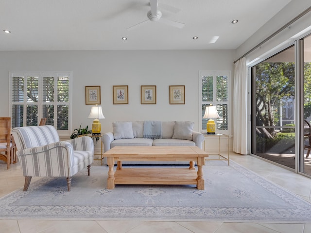 tiled living room featuring ceiling fan