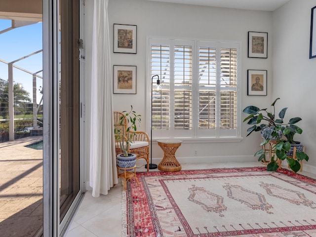 interior space with tile patterned floors and a wealth of natural light