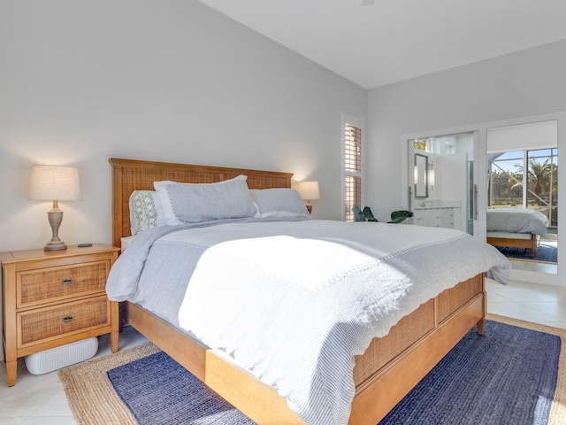 tiled bedroom with connected bathroom