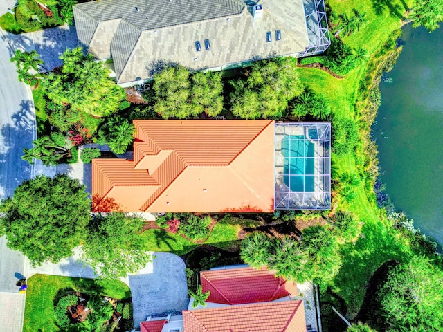 birds eye view of property featuring a water view