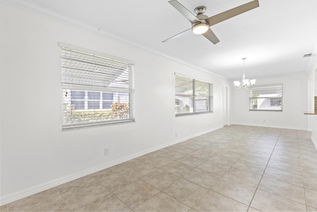 unfurnished room featuring a wealth of natural light, light tile patterned floors, and ornamental molding