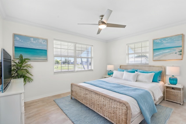 bedroom featuring ceiling fan, ornamental molding, light hardwood / wood-style flooring, and multiple windows