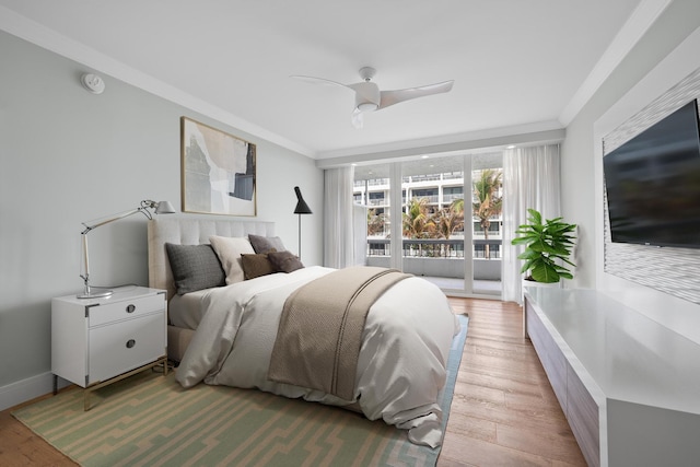 bedroom with access to outside, ceiling fan, light hardwood / wood-style flooring, and ornamental molding