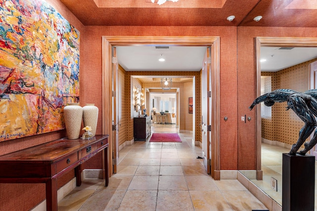 hallway featuring light tile patterned floors