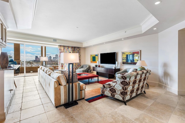 living room with a raised ceiling, crown molding, and expansive windows