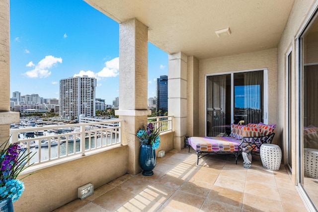 balcony featuring a water view