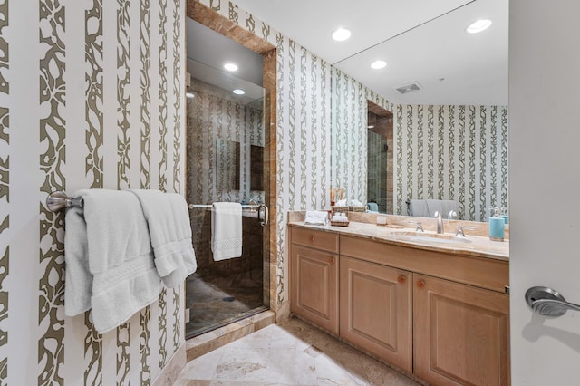 bathroom with vanity and walk in shower