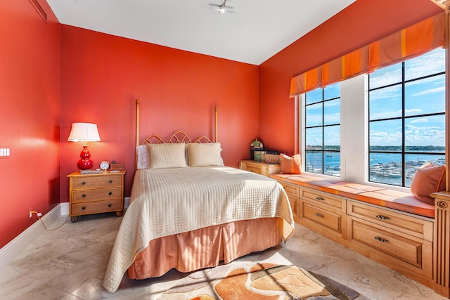 bedroom with a water view