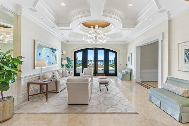 living room featuring coffered ceiling, crown molding, french doors, and a chandelier