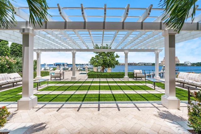 view of patio / terrace featuring a water view, an outdoor hangout area, and a pergola