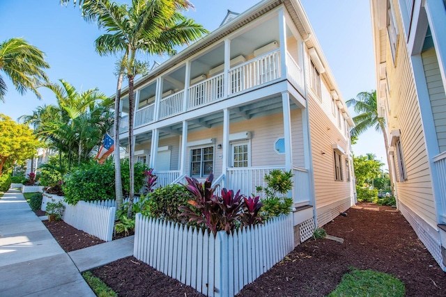 view of front of property with a balcony