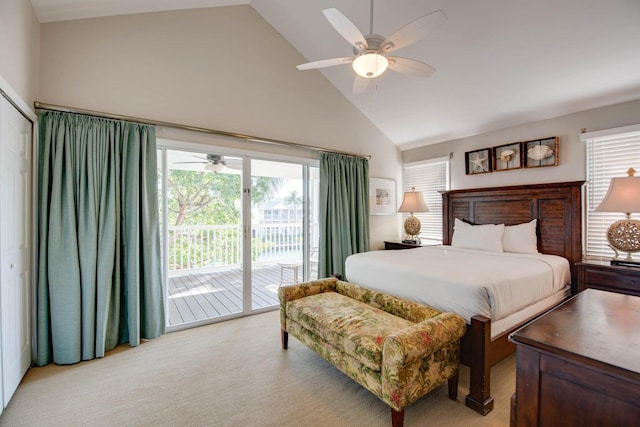 carpeted bedroom with ceiling fan, high vaulted ceiling, multiple windows, and access to outside