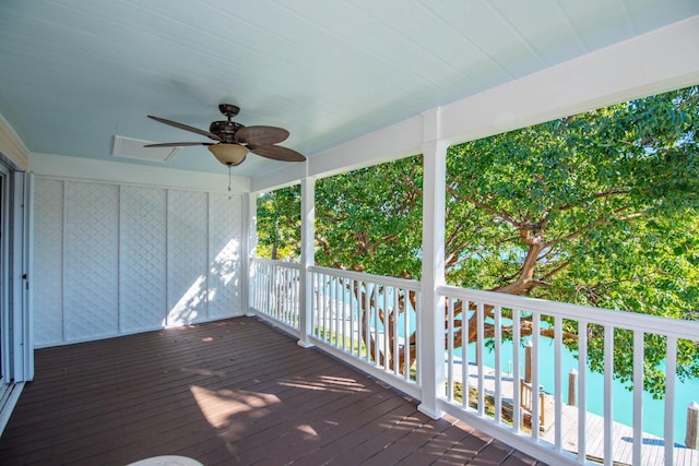 wooden terrace with ceiling fan