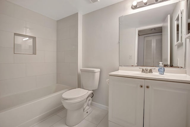 full bathroom featuring tile patterned floors, vanity, toilet, and shower / tub combination