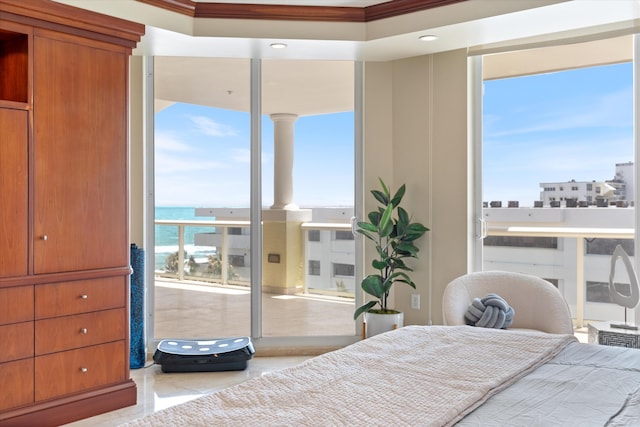 bedroom with a water view and ornamental molding