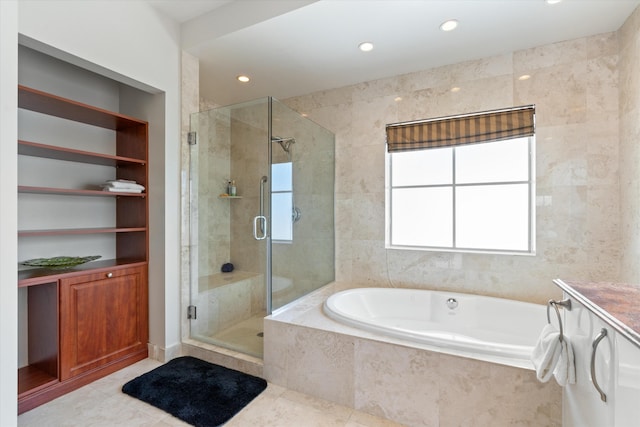 bathroom featuring tile patterned floors and plus walk in shower