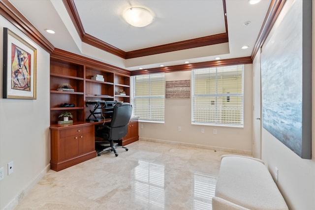 office space featuring ornamental molding and a tray ceiling