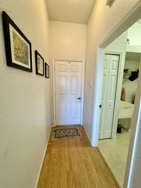 hall featuring light wood-type flooring