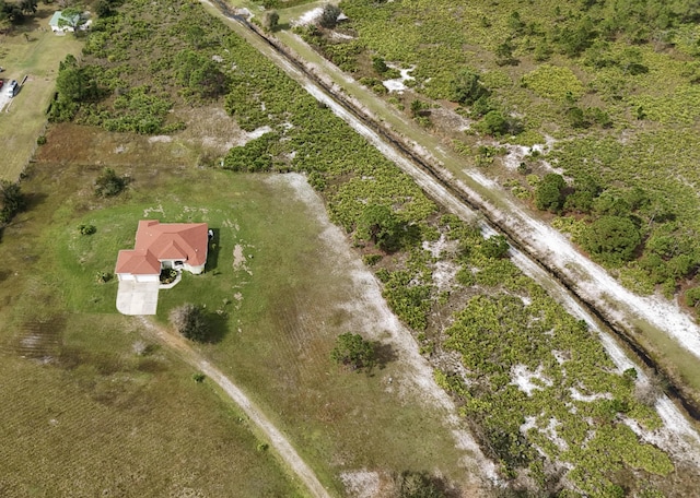 birds eye view of property featuring a rural view