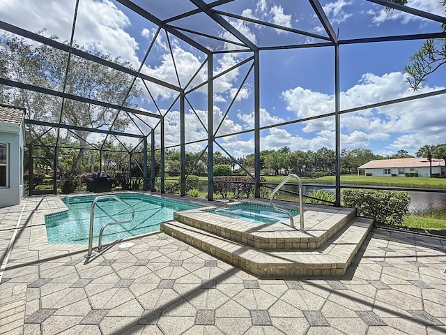 view of swimming pool with a lanai, an in ground hot tub, a water view, and a patio