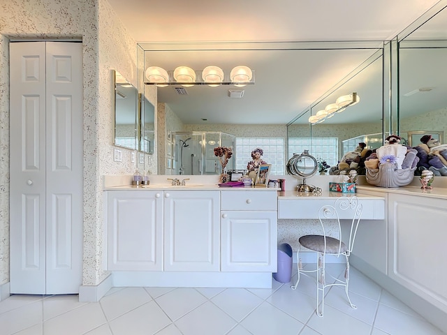 bathroom with vanity, tile patterned floors, and an enclosed shower