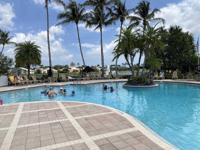 view of swimming pool featuring a patio area