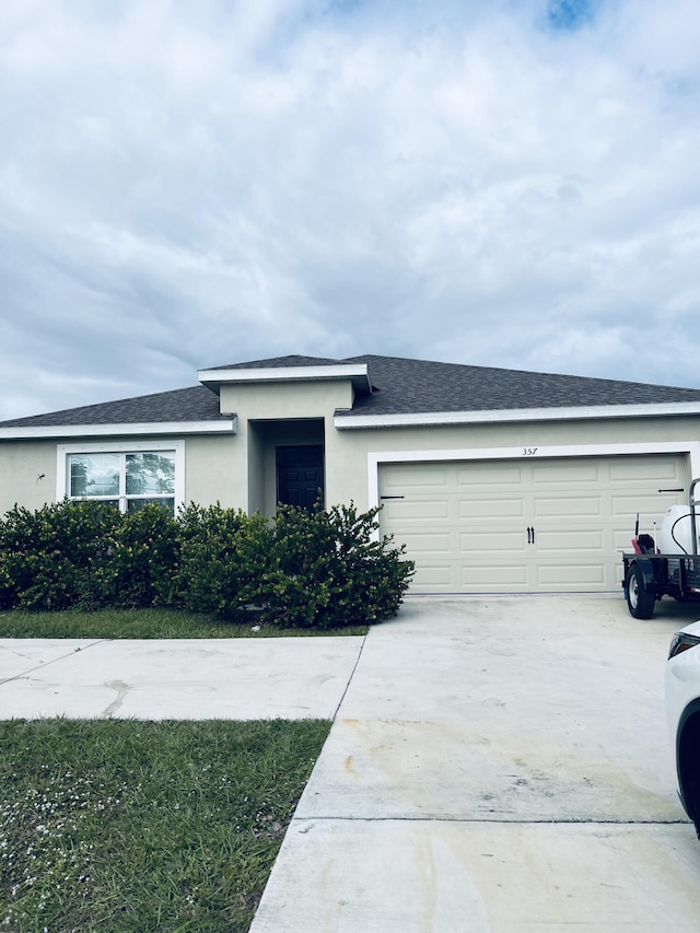 view of front of home featuring a garage